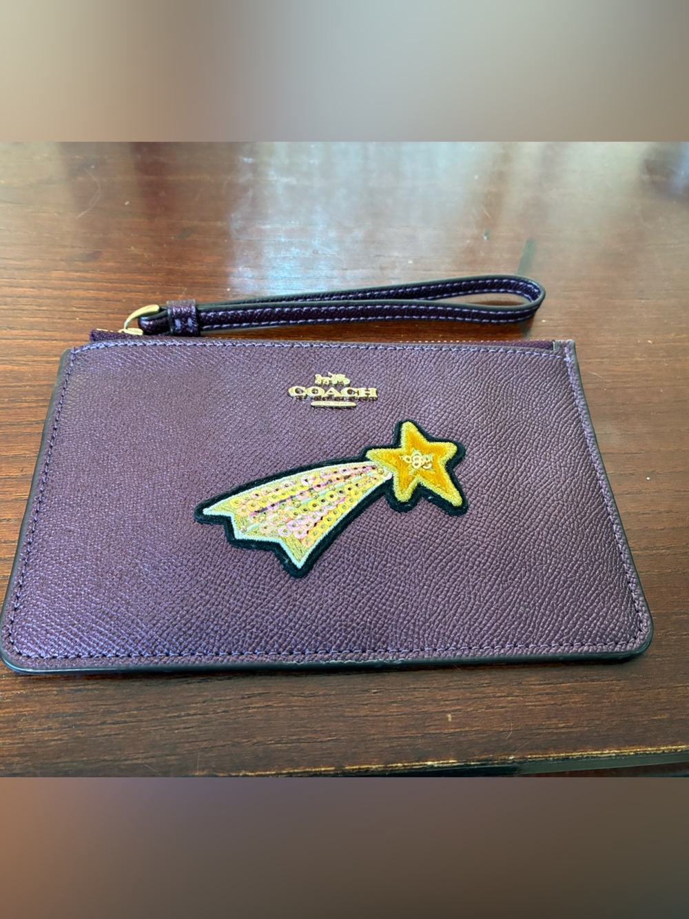 Coach Shooting Star Plum Wristlet